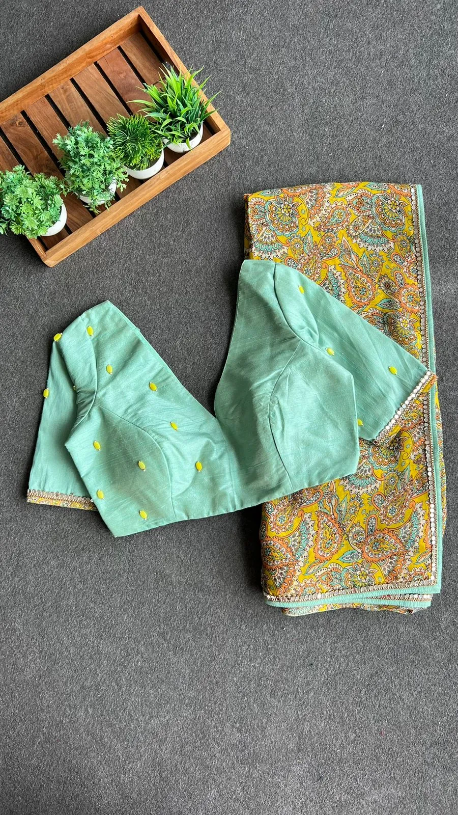 Fenugreek floral organza saree with hand worked blouse