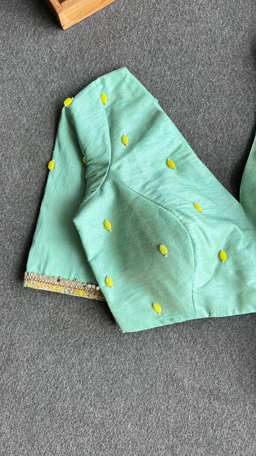 Fenugreek floral organza saree with hand worked blouse